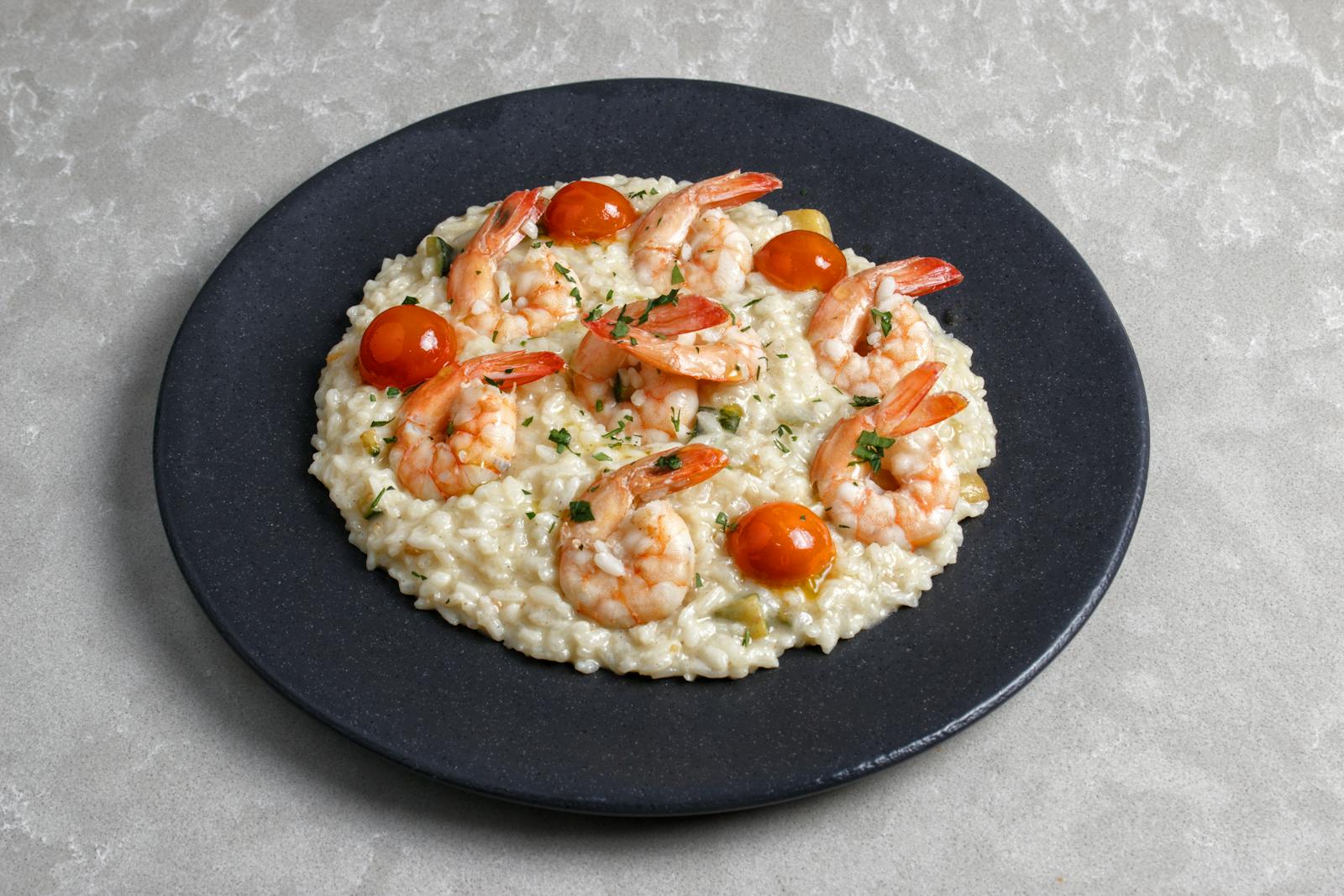 Risotto crémeux aux gambas grillées et tomates cerises